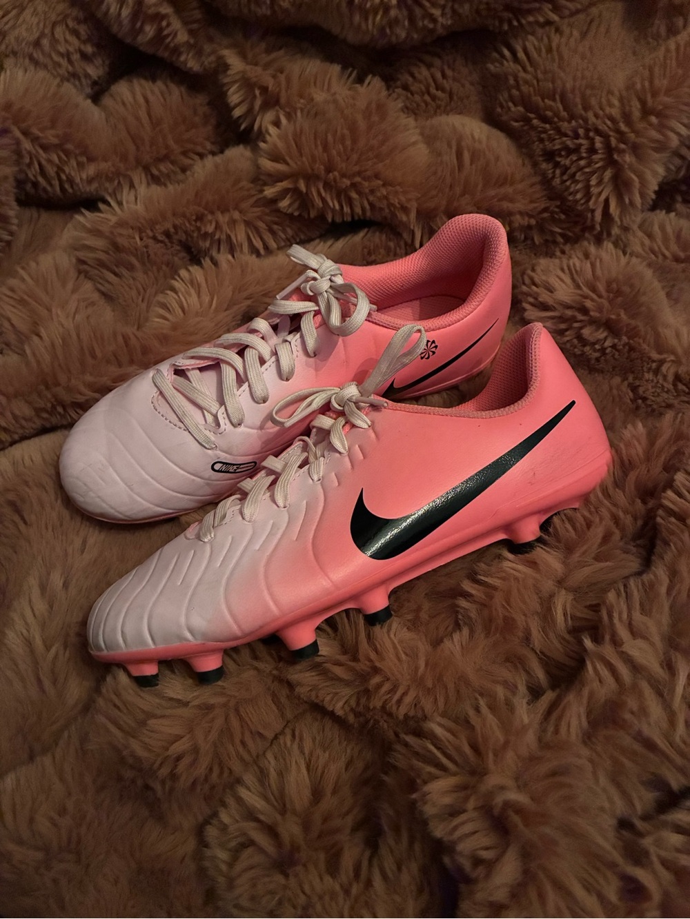 Nike Women's Pink and White Football Cleats with Black Swoosh